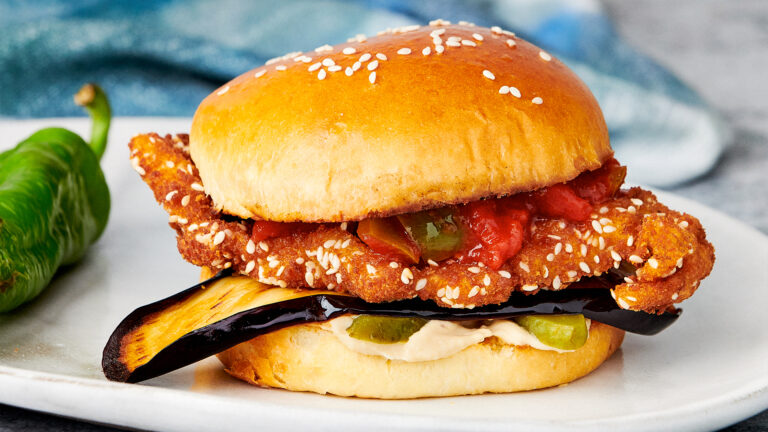Schnitzel Sandwich with Fried Eggplant & Matbucha in a Brioche Bun